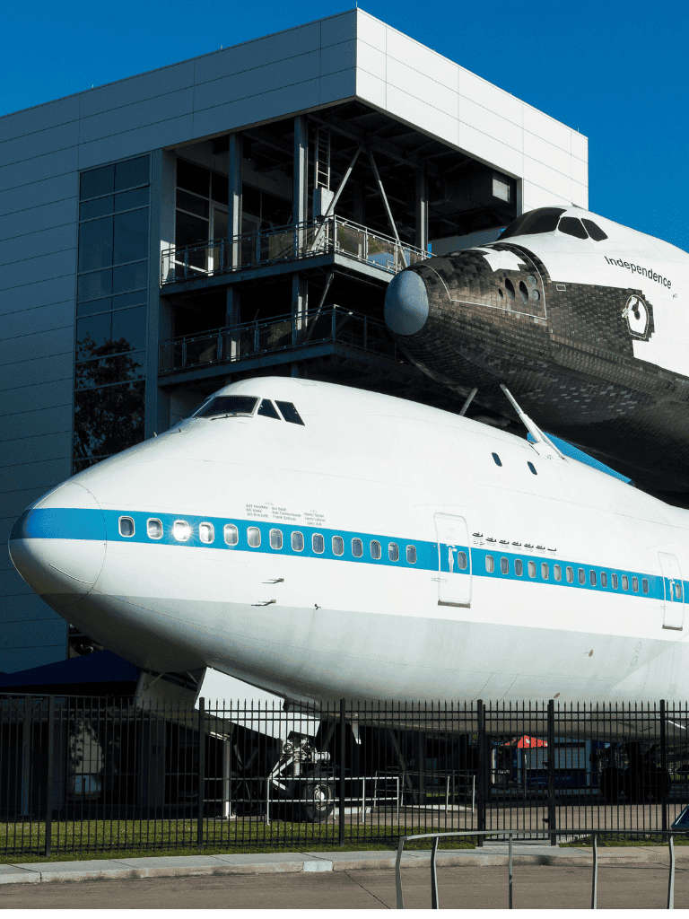 1. NASA space shuttle display at QuestForDirections aerospace museum, educational tour attraction.