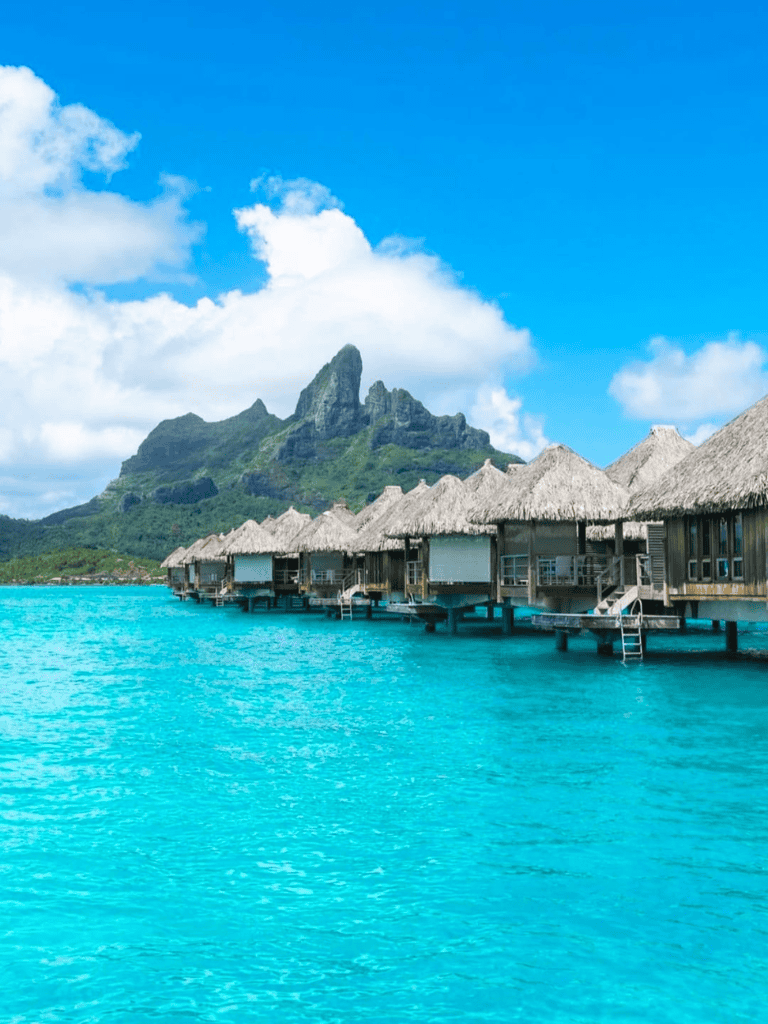 Overwater Bungalows in Bora Bora with Mountain View, Tahiti vacation resort.