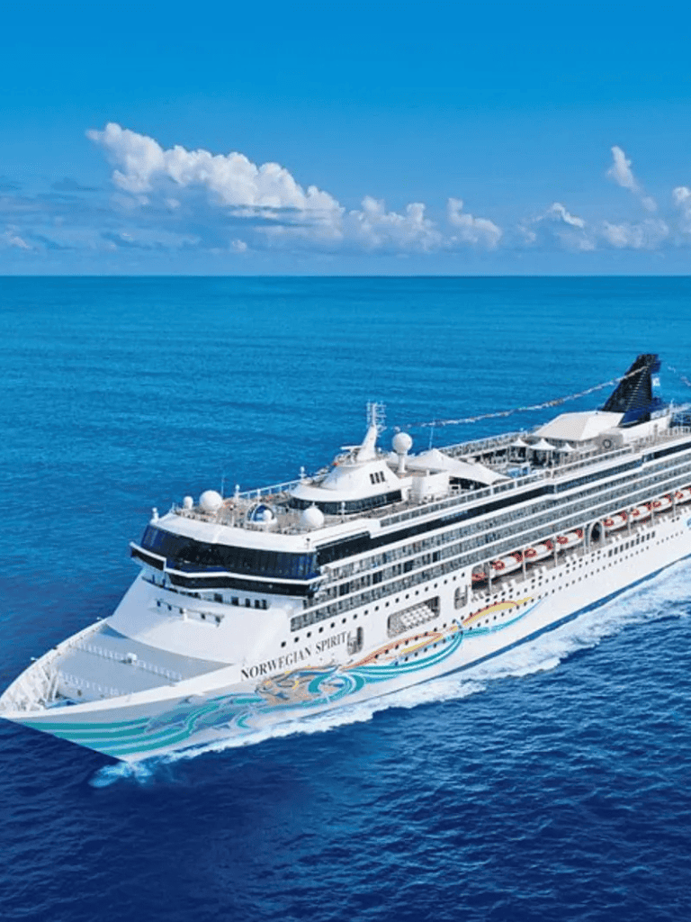 Luxurious cruise ship Norwegian Spirit sailing in open ocean for travel and adventure.