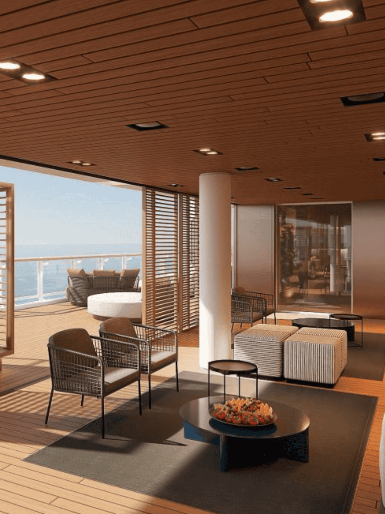 Comfortable lounge area with ocean view and modern interior design at Quest for Directions office.