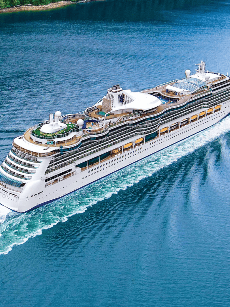 Luxury cruise ship sailing on ocean, QuestForDirections travel, guided adventure, private yacht voyage, ocean exploration, travel destination, cruise holiday, boating voyage, seafaring trip.