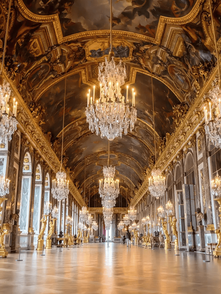 Luxurious baroque palace interior with ornate gold decor, grand chandeliers, and expansive hallways.