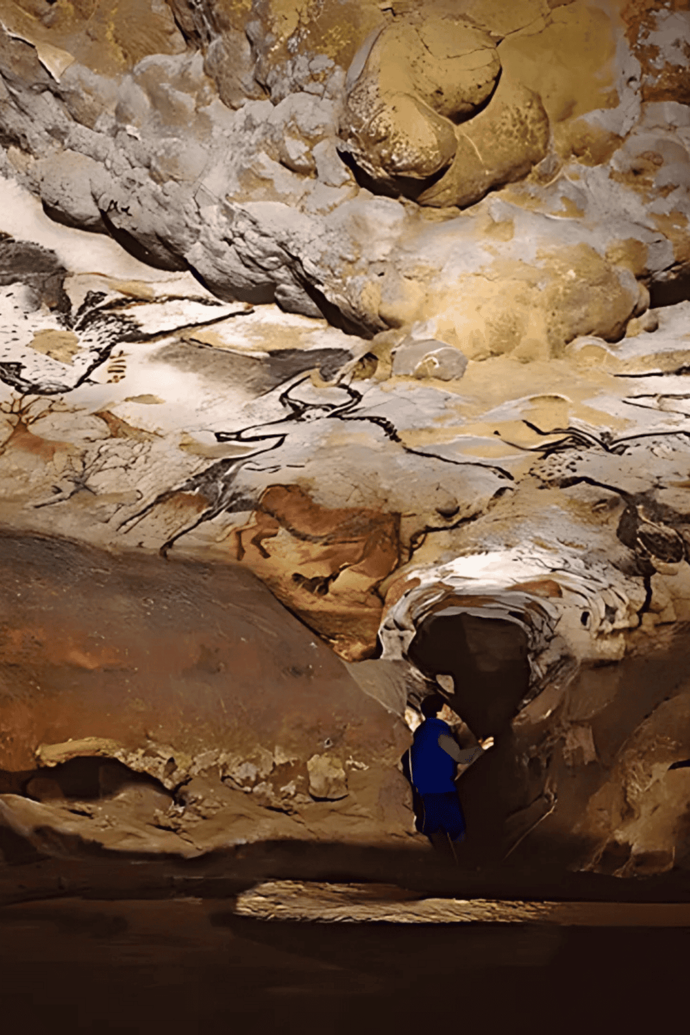 1. Caving adventure inside a rocky canyon with a person exploring underground tunnels.