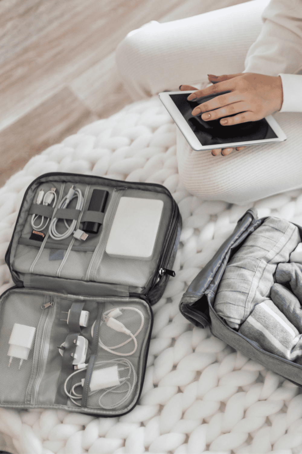 Portable travel charging kit with power bank and accessories for travel convenience.