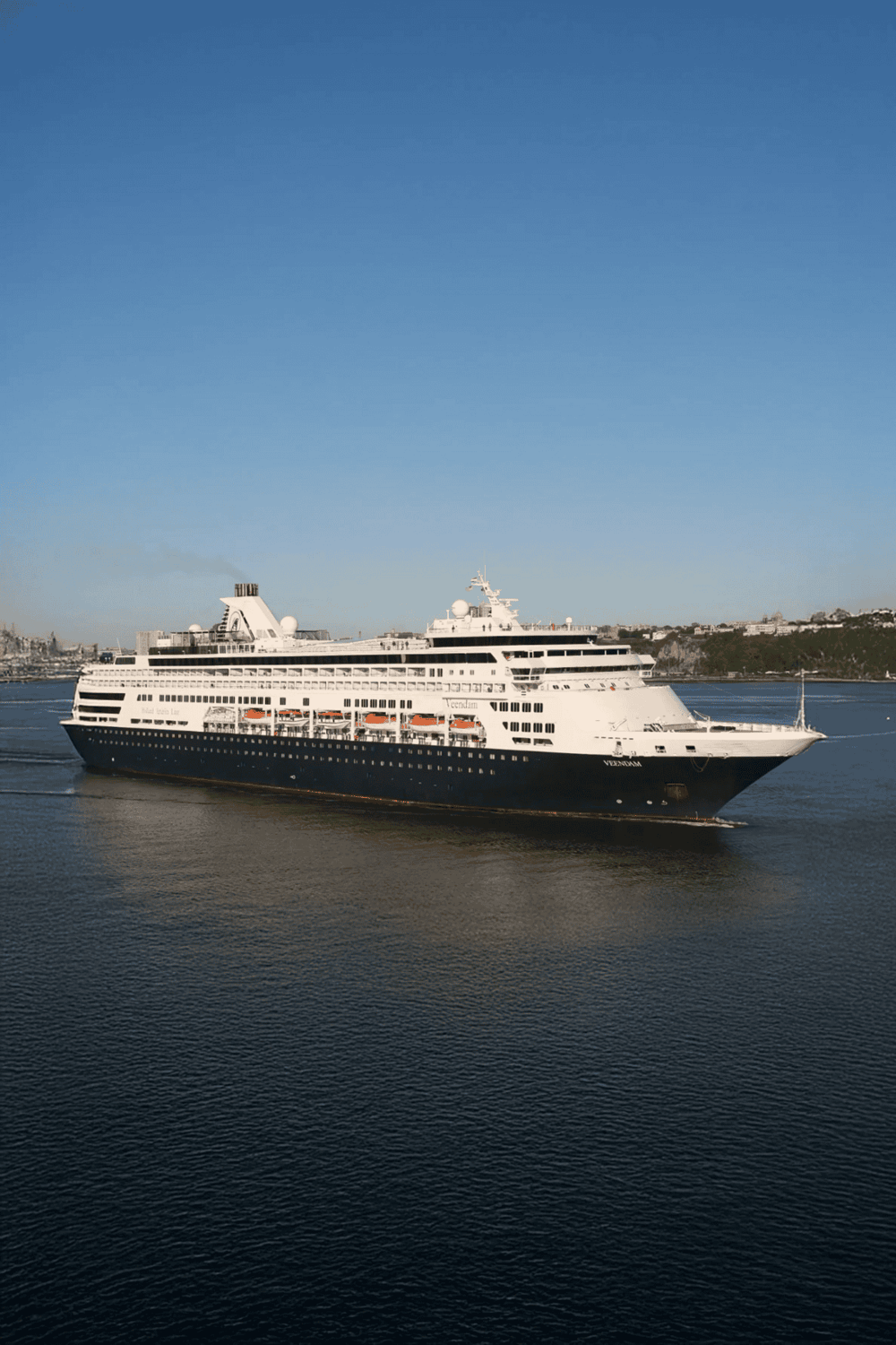 Luxurious cruise ship at harbor, exemplifying QuestForDirections travel and maritime services.
