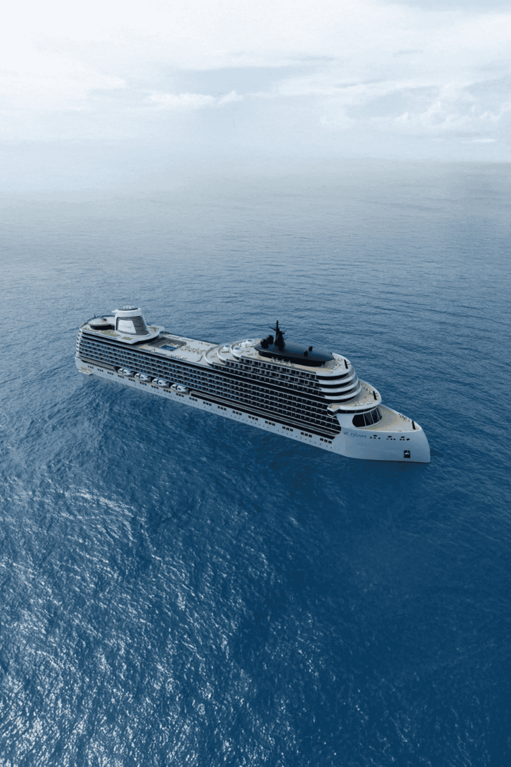 Luxurious cruise ship sailing in open ocean, vacation, travel, maritime adventure, yacht cruise, ocean voyage.