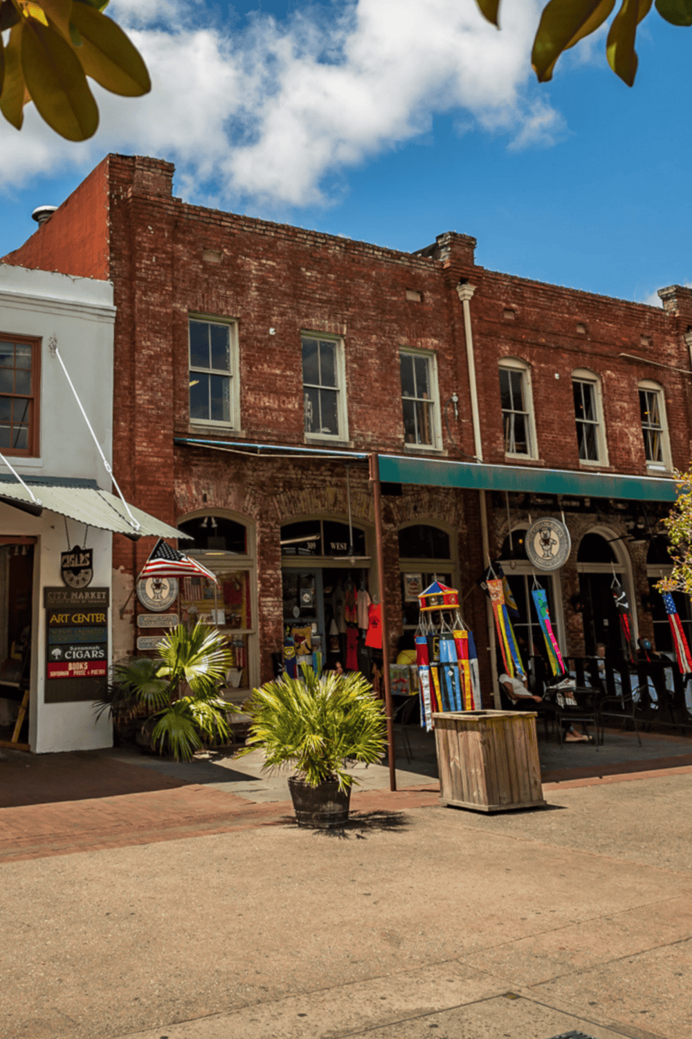 Charming downtown street with historic brick buildings and local shops, perfect for exploring and guiding your journey.