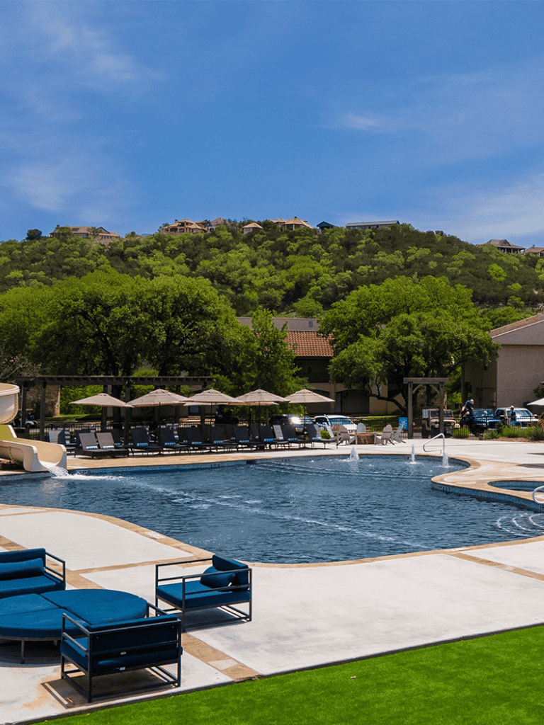 Relaxing poolside area at Quest for Directions luxury resort.