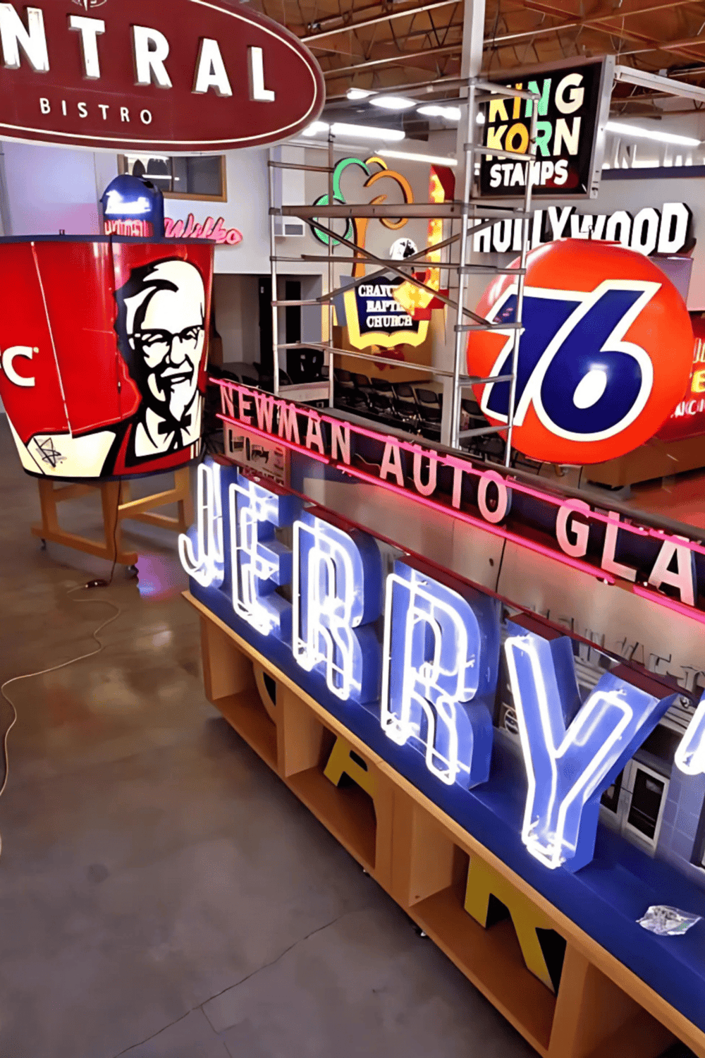 Colorful vintage neon signs and classic branding decor at QuestForDirections showroom.