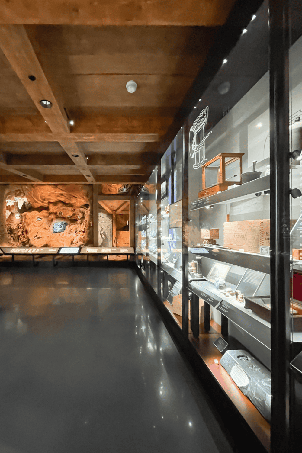 Ancient artifacts display at Quest for Directions museum, showcasing geological and archaeological discoveries.