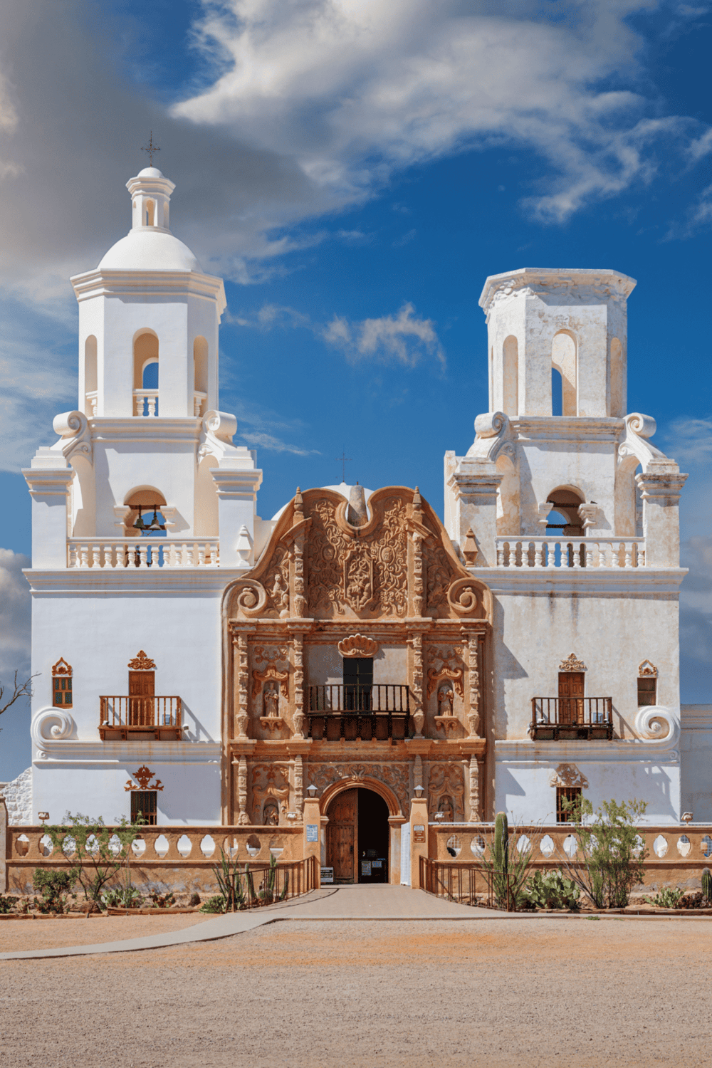 Colorful historic church with ornate architecture on sunny day, perfect for travel and exploration.