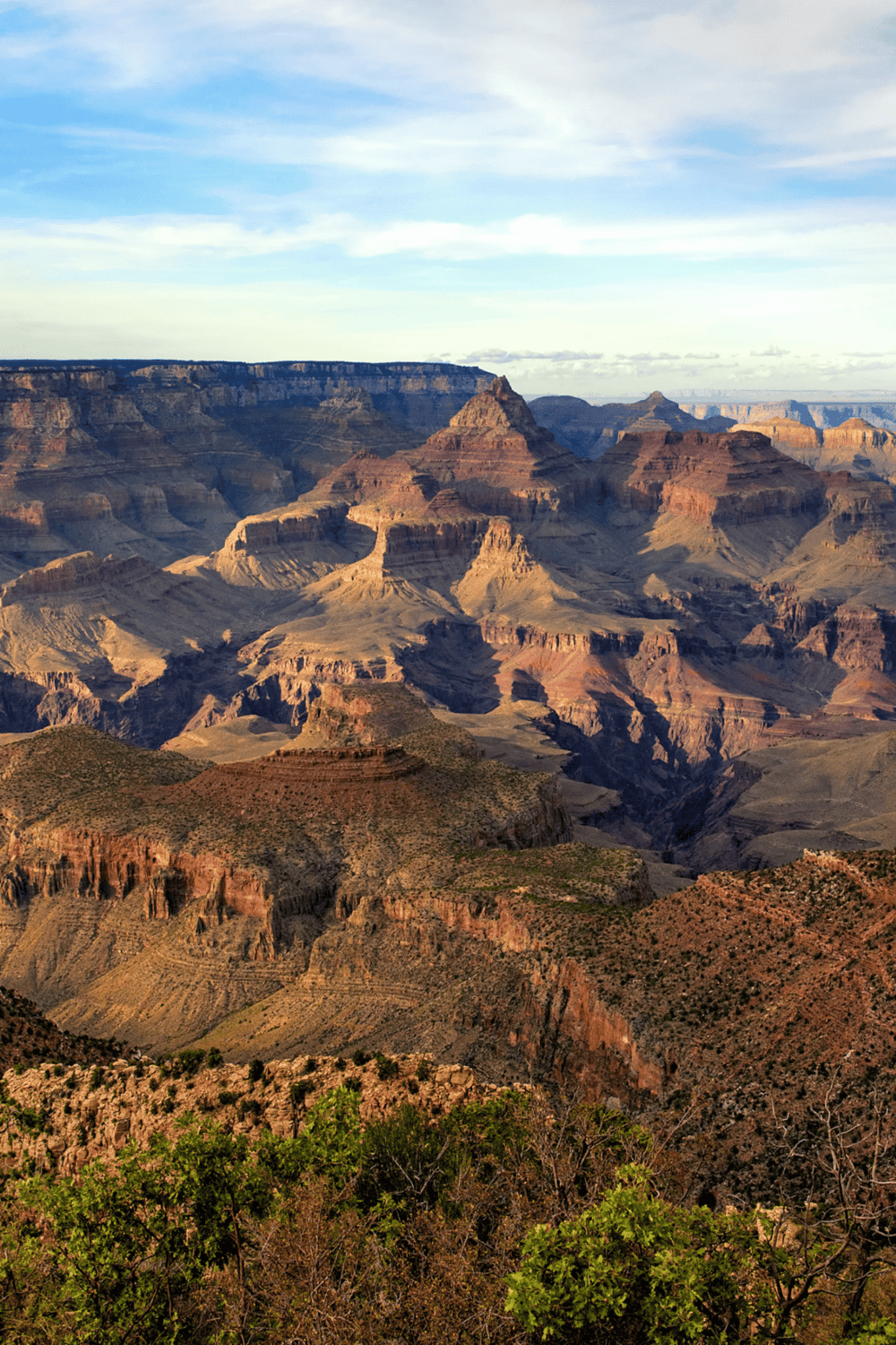 Vibrant Grand Canyon landscape emphasizing colorful rock formations and expansive vistas.