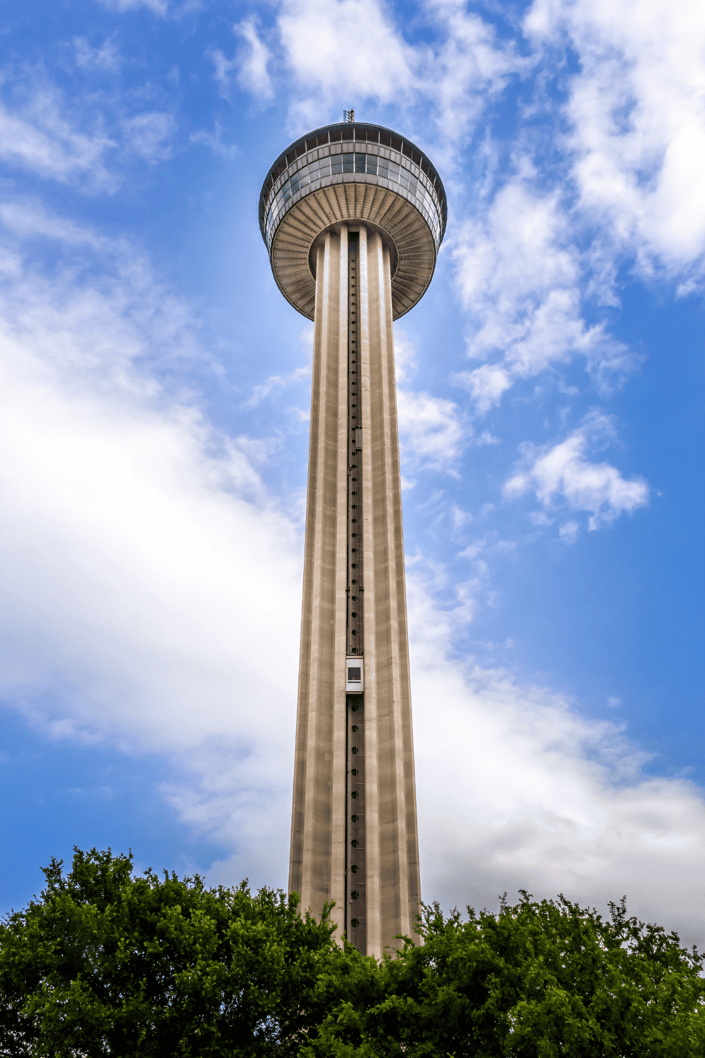 Wide-angle view of the iconic Stratosphere Tower in Las Vegas, showcasing its unique observation deck and towering structure.