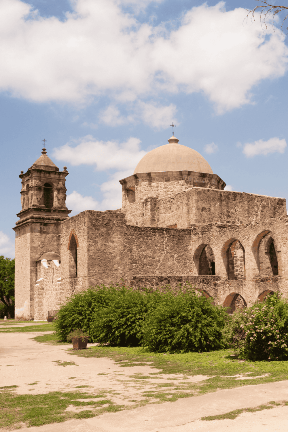 Historic mission church in San Antonio, Texas, showcasing classic Mission-style architecture.