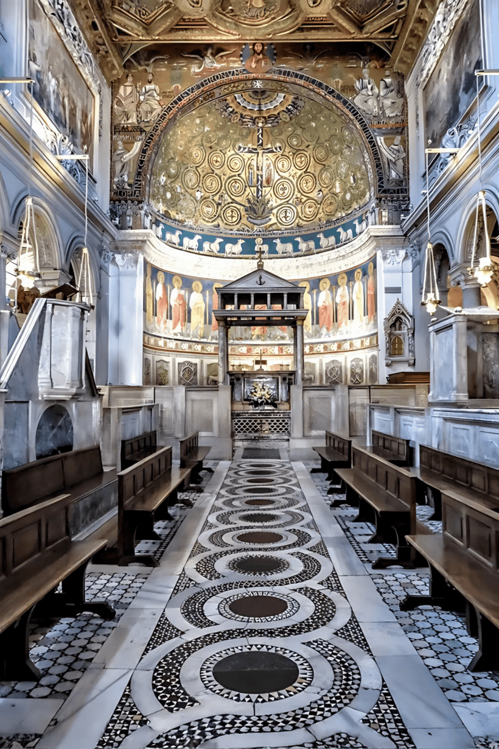 Intricate church interior with lavish gold mosaics, ornate architecture, and religious artwork, representing historic European ecclesiastical art.