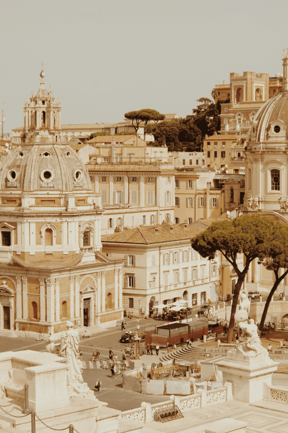 Colorful Rome cityscape with historic churches and architectural landmarks.