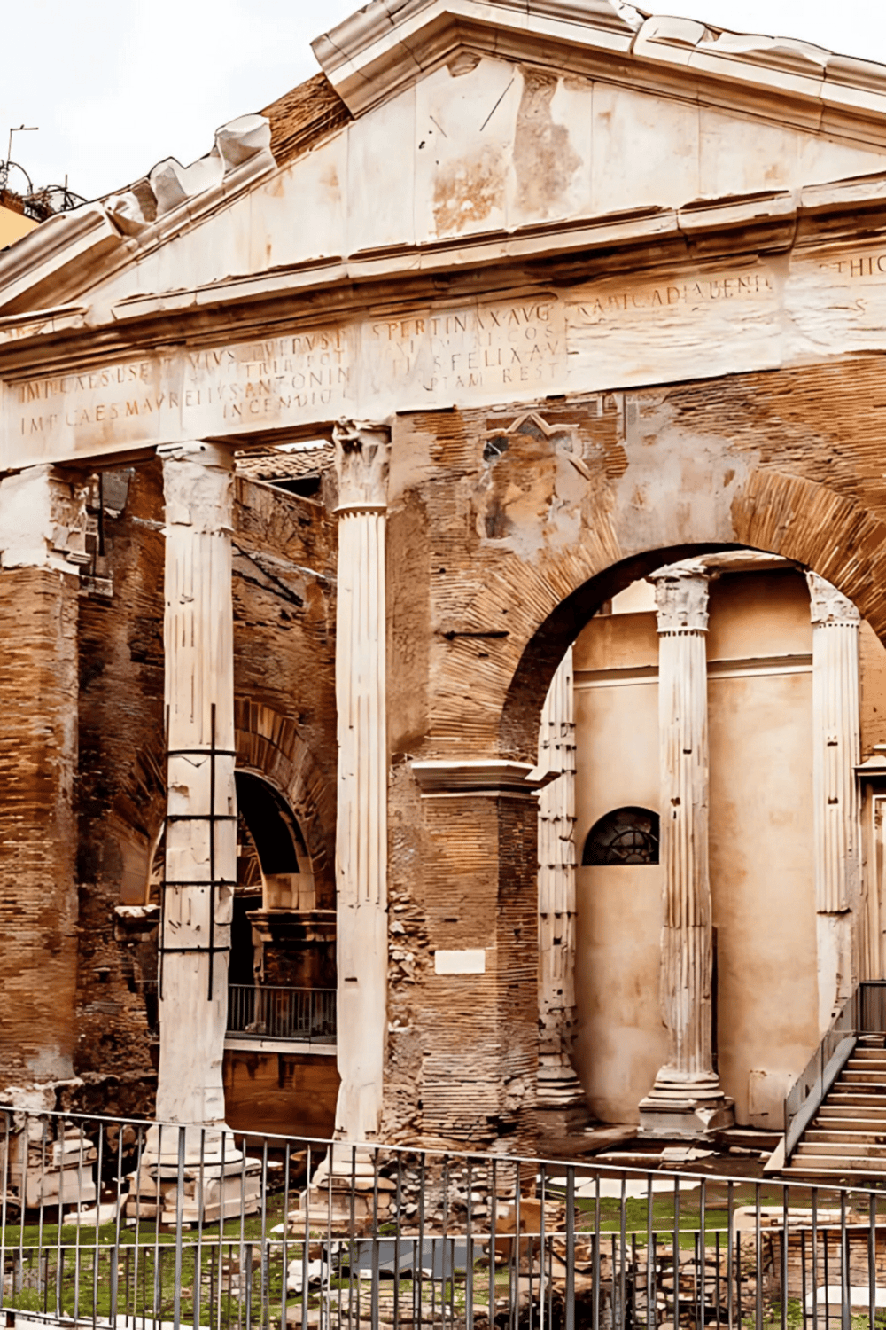 Ancient Roman ruins with columns and arches at QuestForDirections, showcasing historic architecture and travel history.