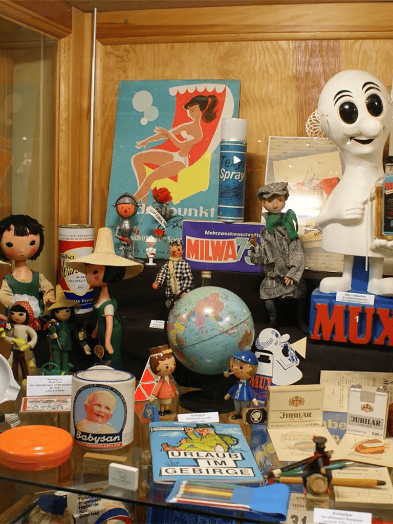 Colorful display of vintage toys, dolls, and collectibles showcasing nostalgic childhood memories.