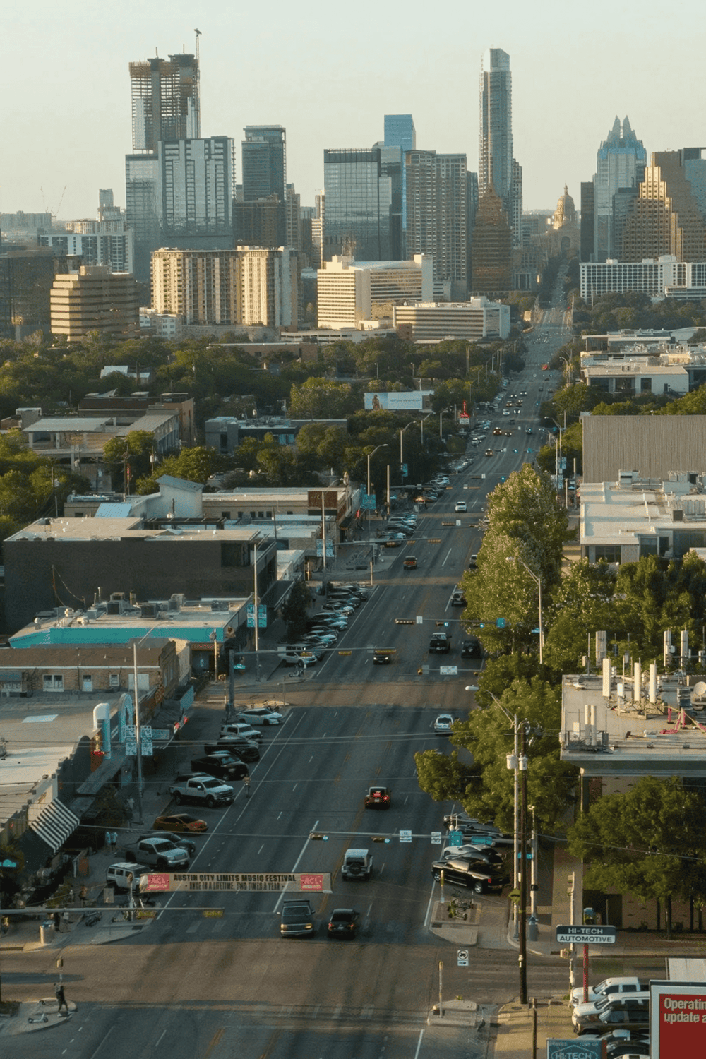 Austin city skyline with downtown skyscrapers and busy streets.