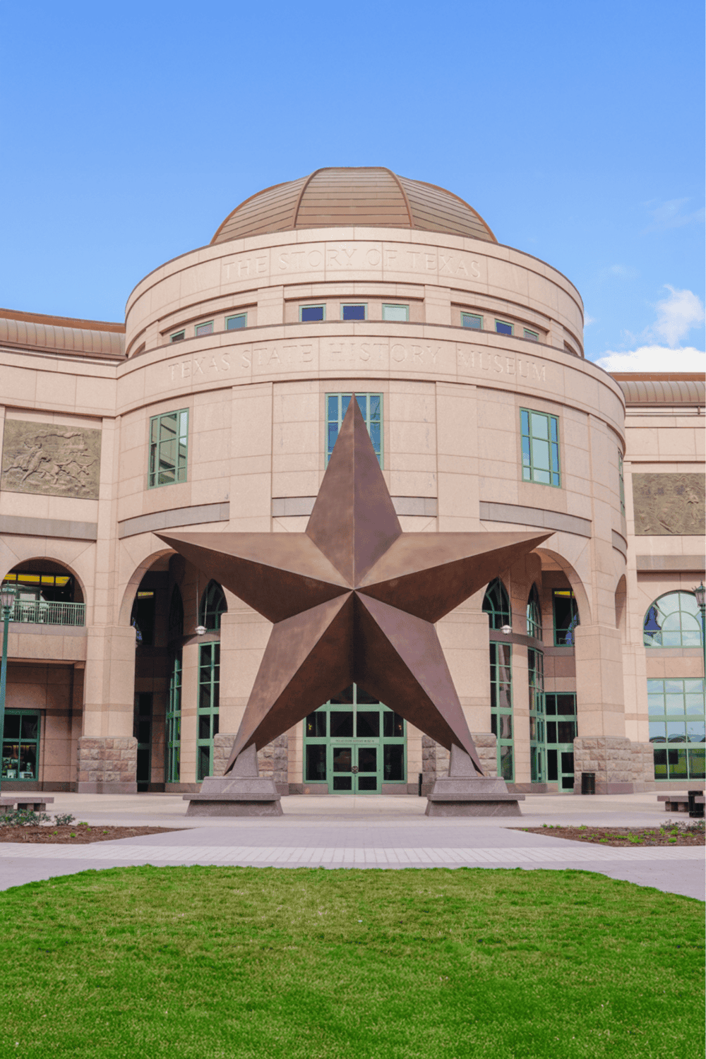 Historic Texas State History Museum with large star sculpture.