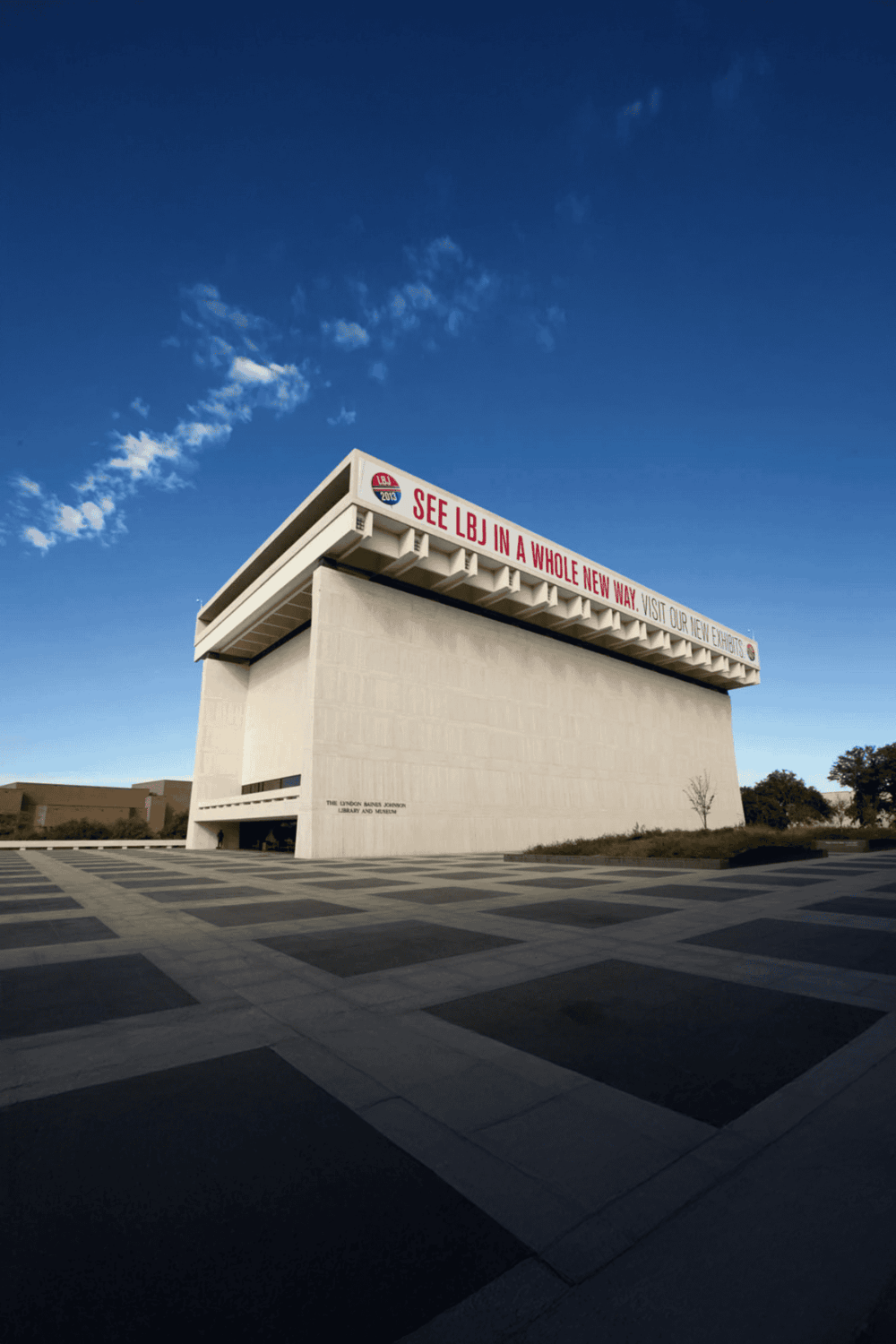 1. Modern library building at QuestForDirections with clear skies and contemporary design.