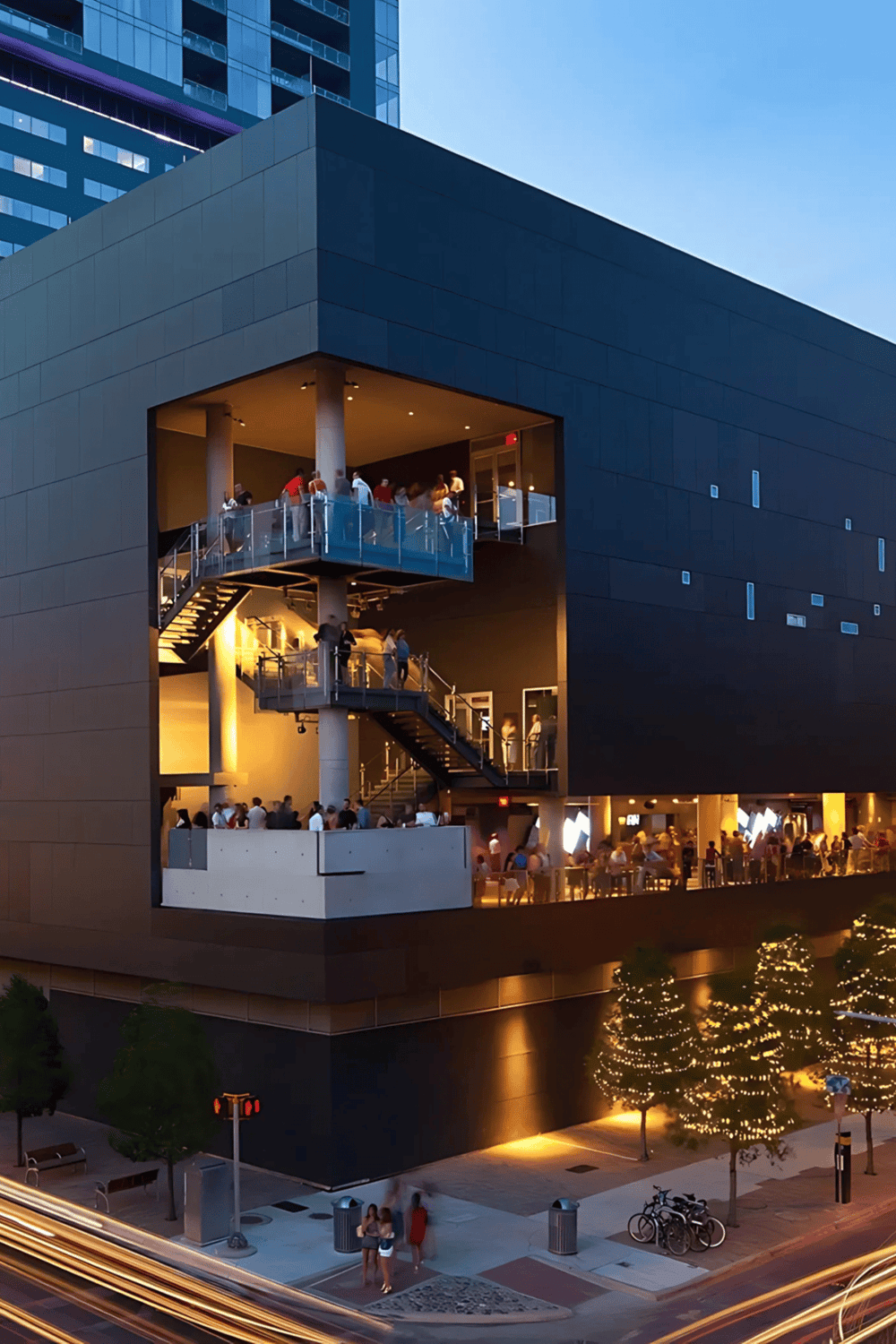 Modern urban rooftop venue with outdoor dining and nightlife, vibrant cityscape views, ideal for social gatherings and events.