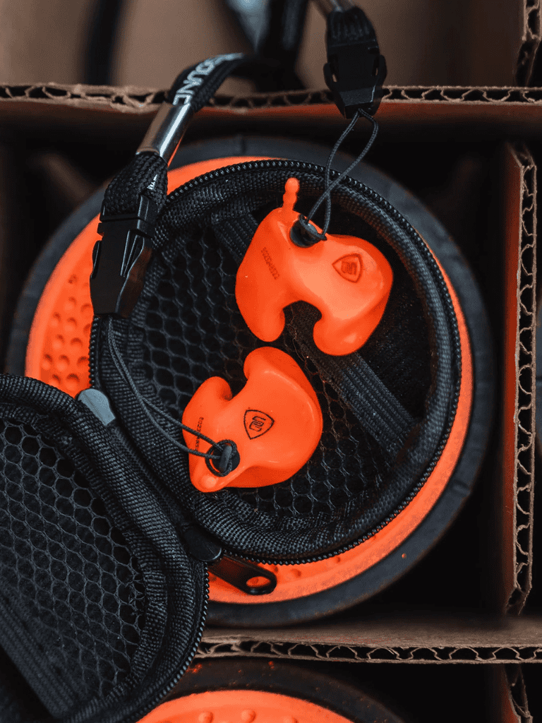 Bluetooth earplugs for outdoor activities, moisture-resistant, and noise-isolating.