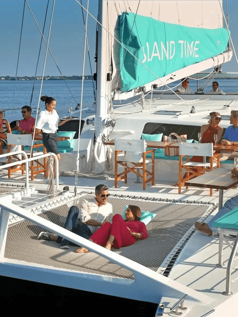 Relaxing on a luxury sailboat during a scenic outing, perfect for island time and exploring beautiful waters.