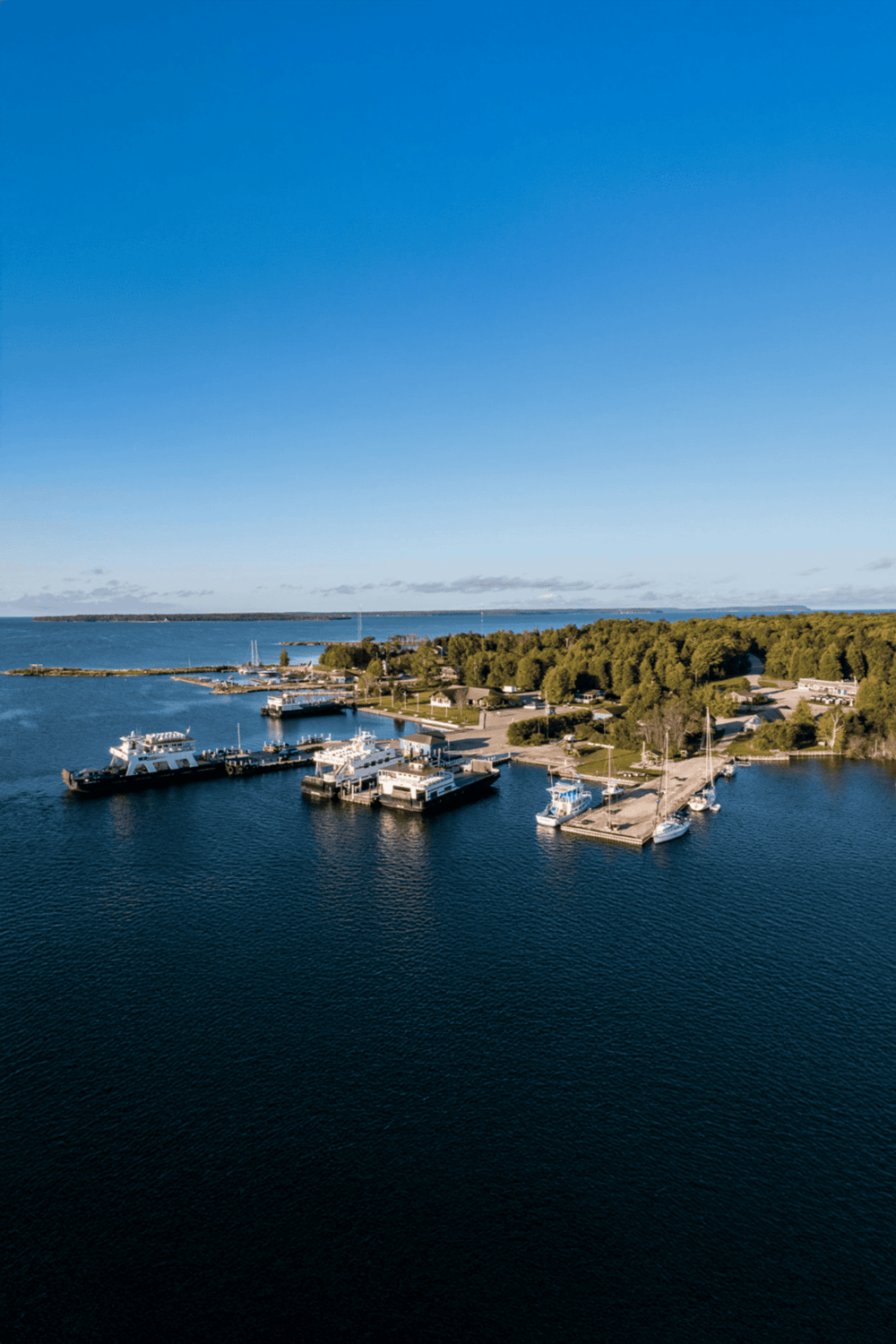 Marina waterfront with boats and scenic views, ideal for navigation and boating guidance.