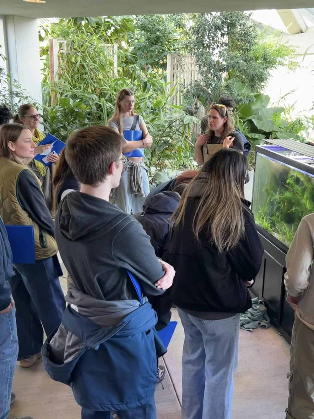 Nature-focused educational tour at QuestForDirections botanical greenhouse.
