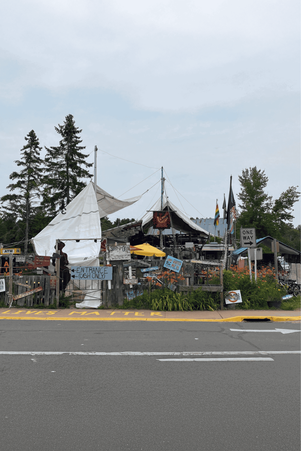 Quaint roadside cafe with eclectic decor and outdoor seating, perfect for travelers seeking local flavor on QuestForDirections.