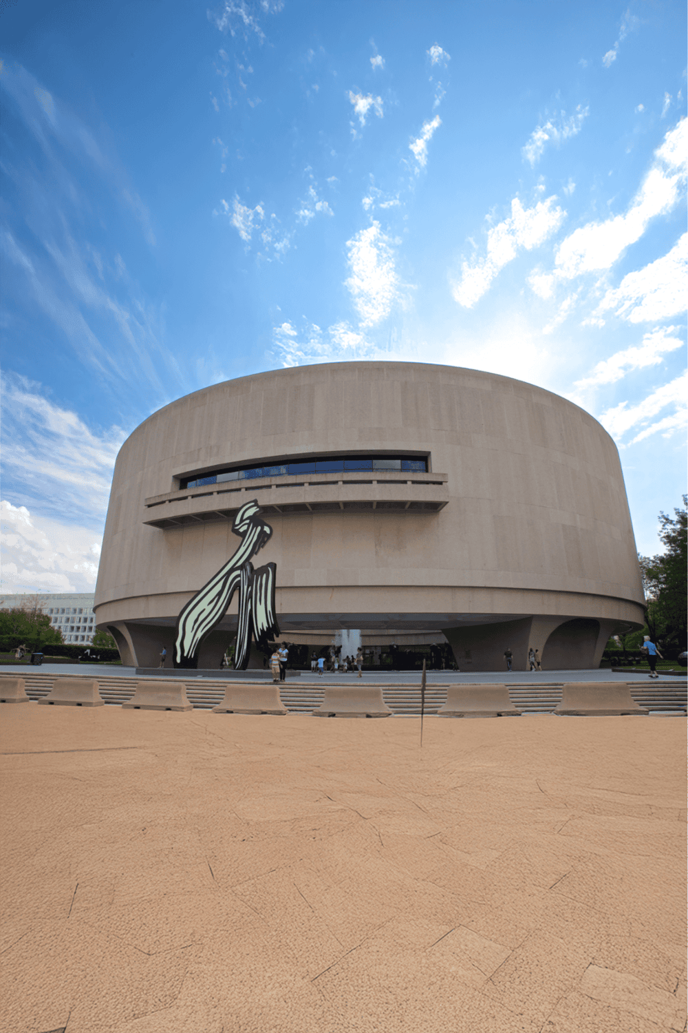 Modern museum building with unique architecture and outdoor plaza, located in downtown Dallas.