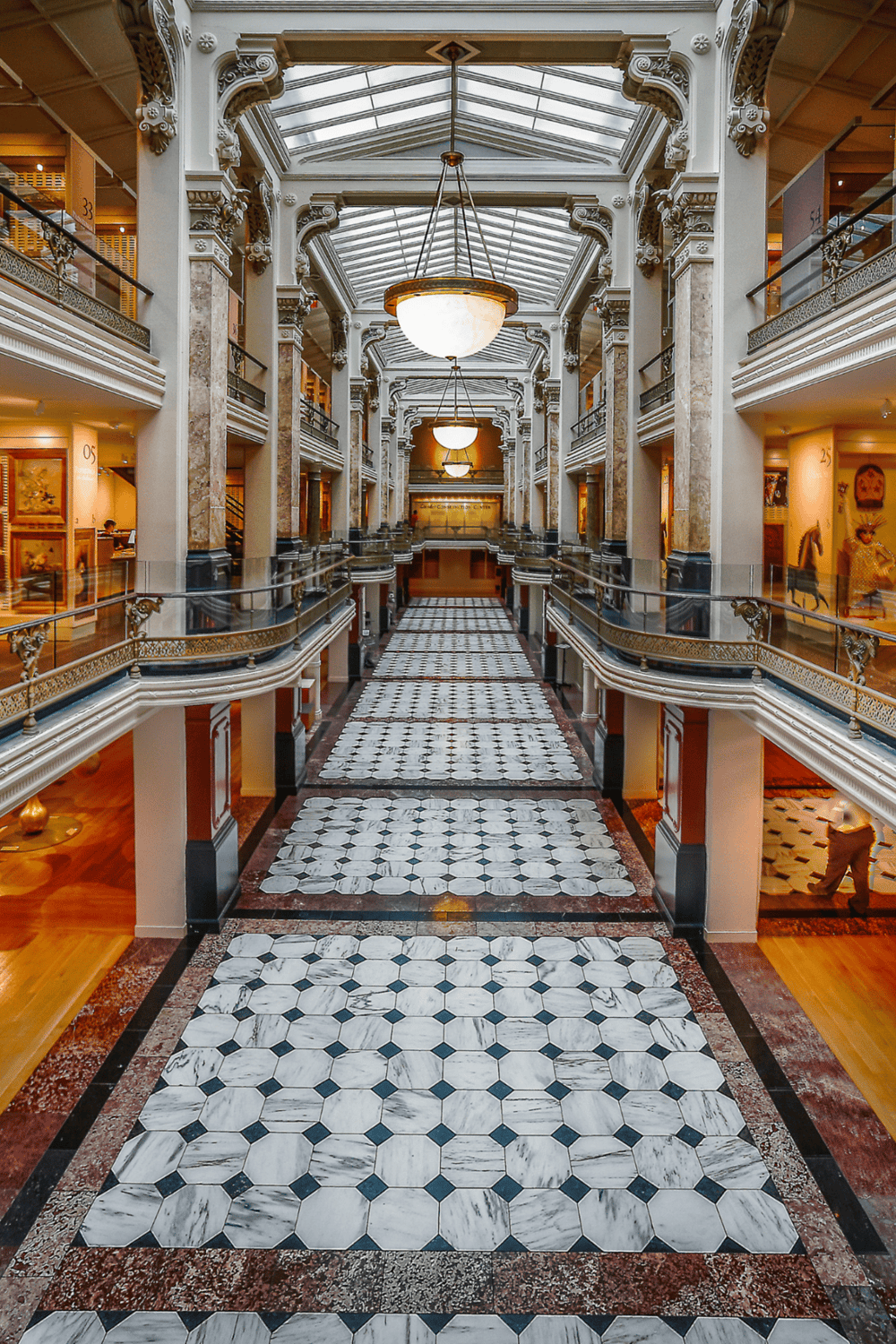 Elegant hotel lobby with marble flooring and classic architecture, perfect for luxury accommodations.