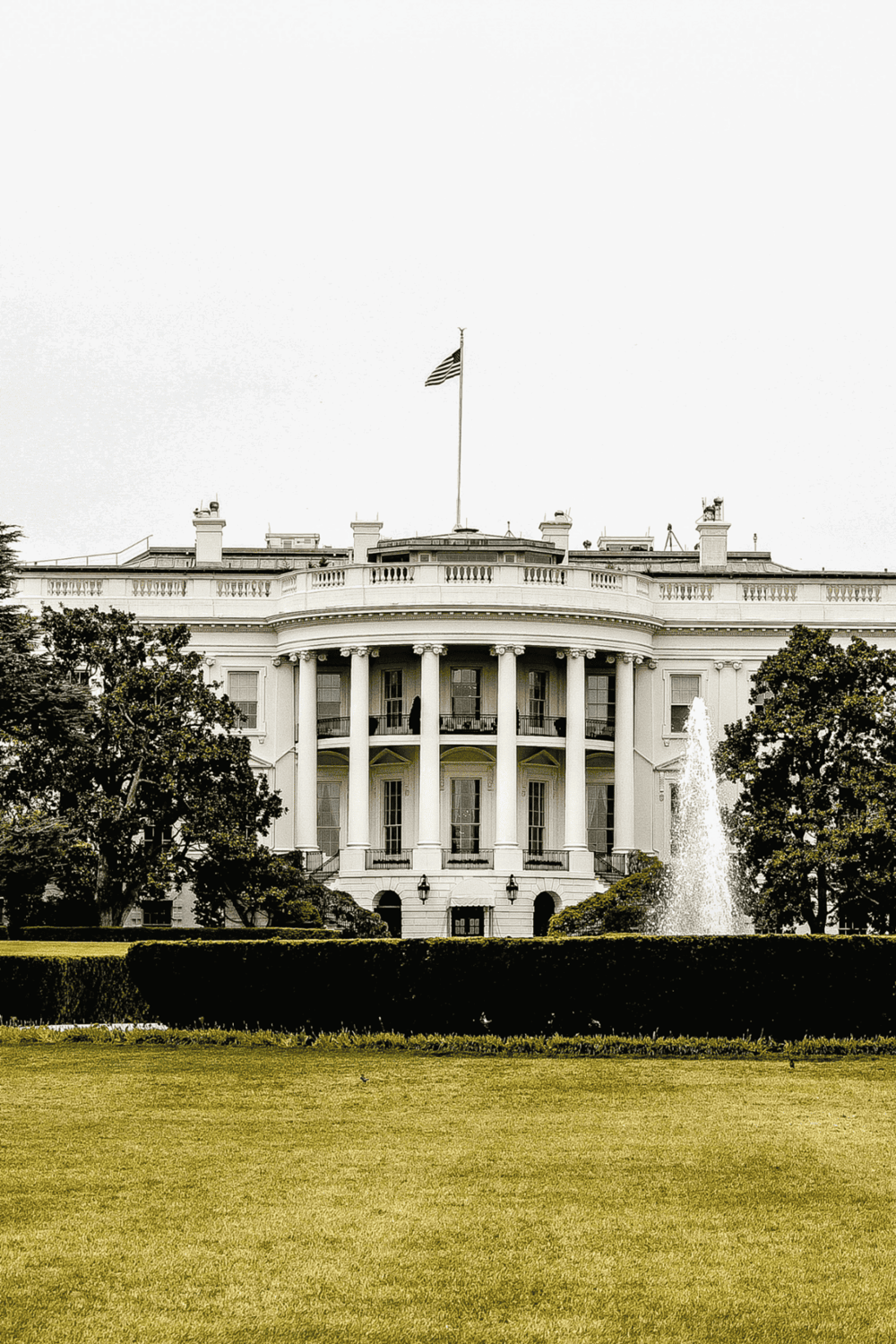 Historic White House with American flag flying, iconic landmark, government building, Washington D.C. tourism, political center, sightseeing, architecture.