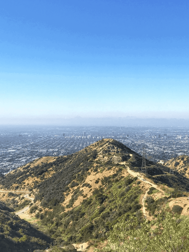 Scenic view of Hollywood Hills overlooking Los Angeles, California from Runyon Canyon Trail.