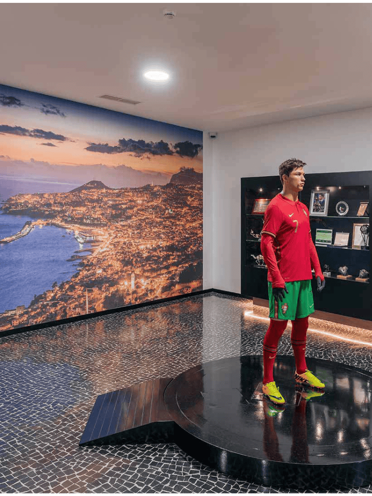 Portugal national football team jersey mannequin display in museum.