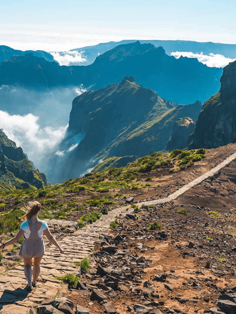 Breathtaking mountain hiking trail with scenic views and lush green landscape.