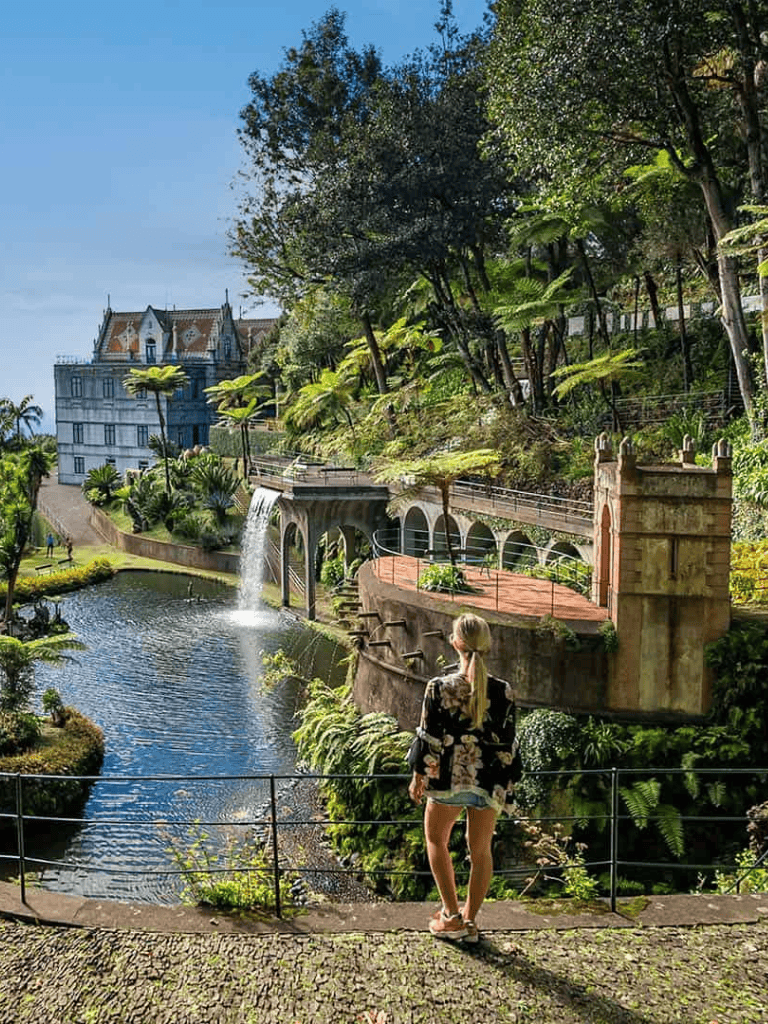 Tranquil garden with waterfalls and lush greenery at QuestForDirections scenic location.