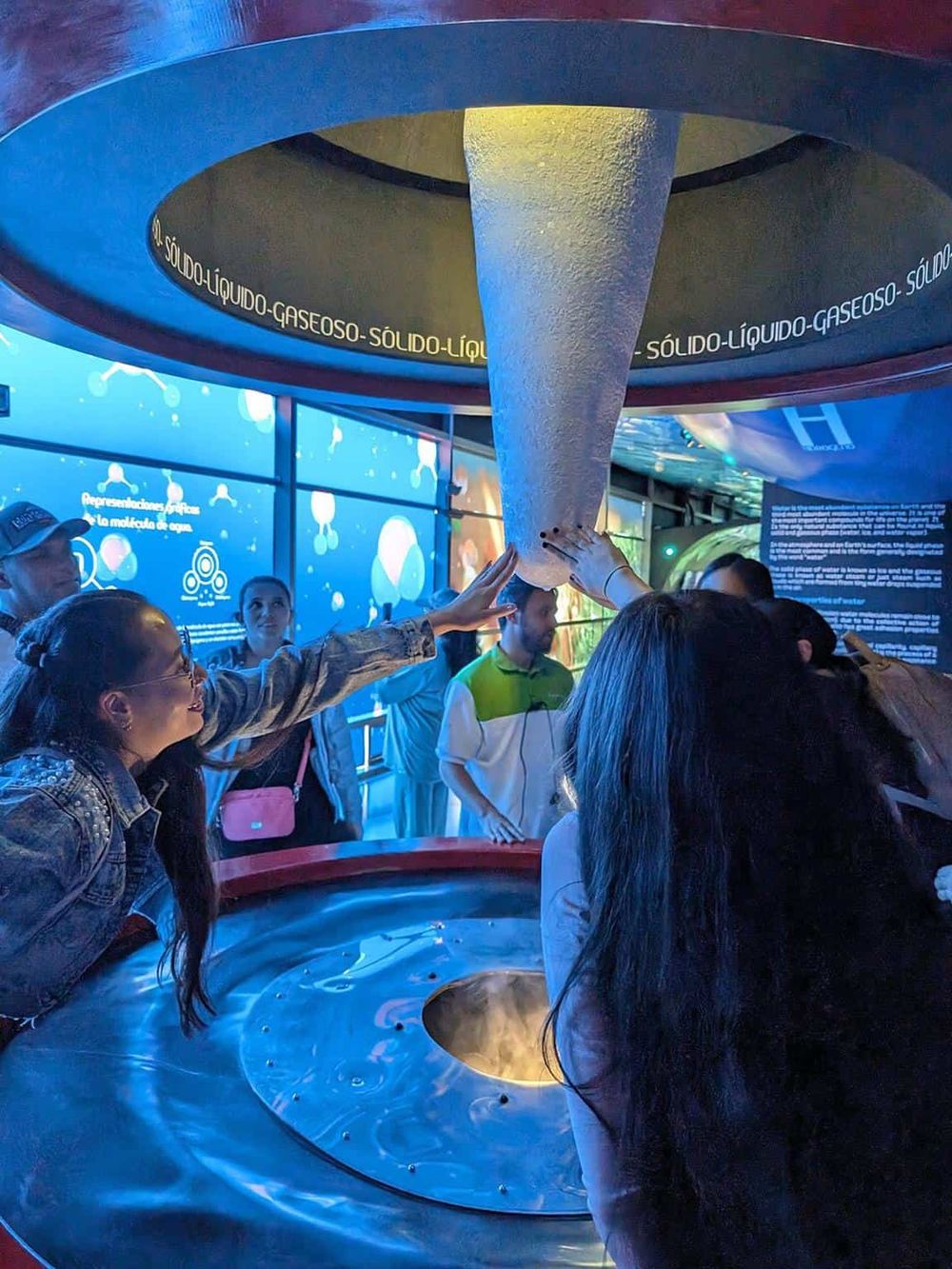 Liquid gas demonstration at interactive science exhibit.