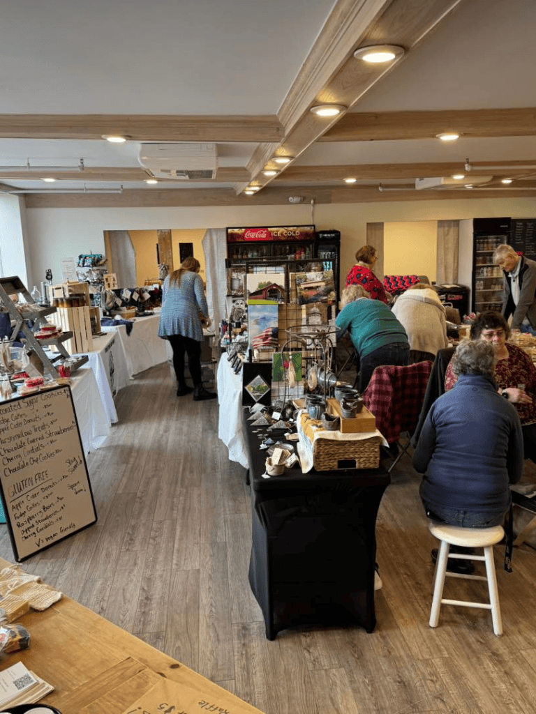 Handmade crafts and local products at QuestForDirections market event.