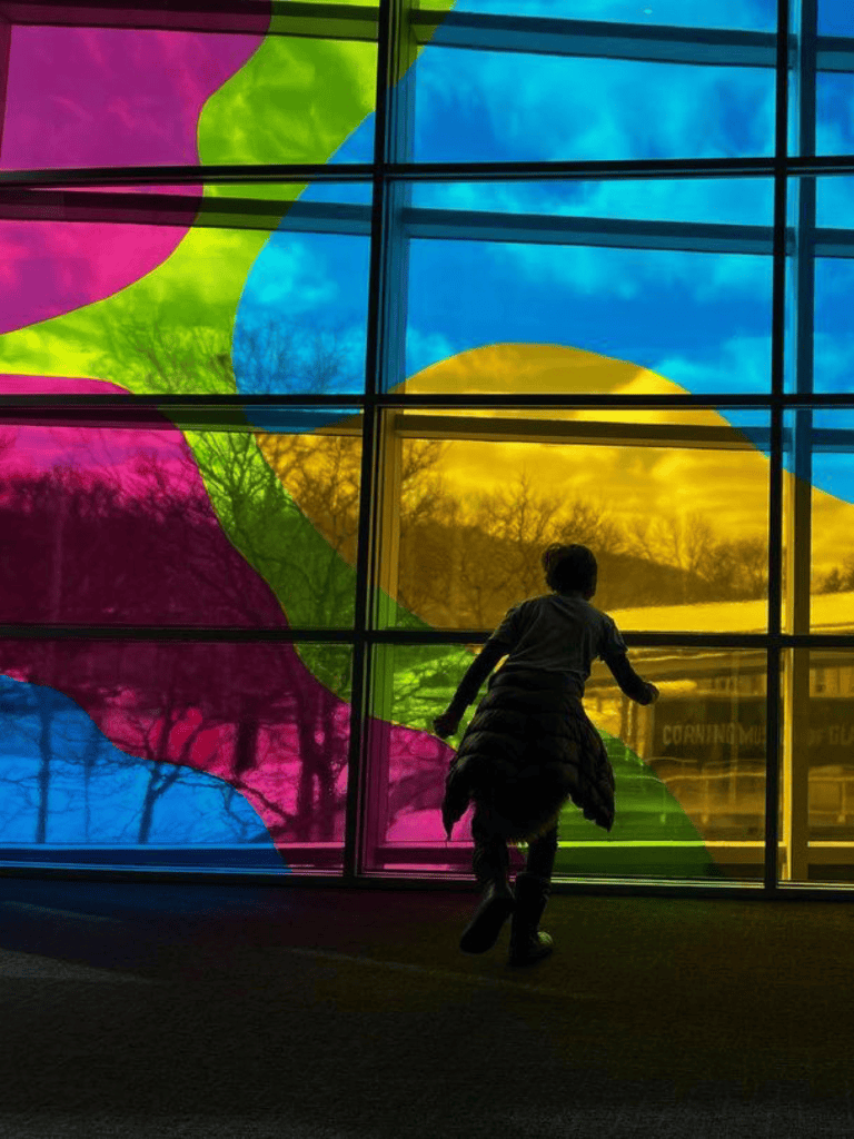 Colorful abstract glass art at QuestForDirections building.