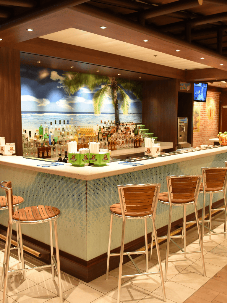 Beach-themed bar with tropical decor and wide selection of spirits and drinks.