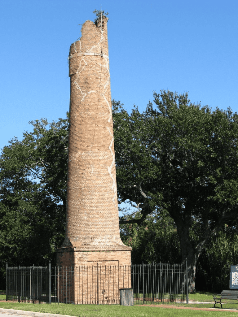 Old brick chimney ruins in San Antonio, Texas, at historic site.