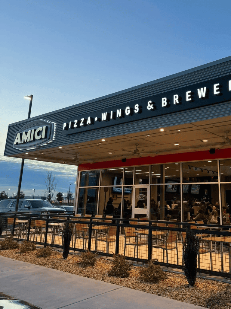 High-quality pizza, wings, and brews at Amici restaurant with outdoor seating, great for casual dining and family friendly.
