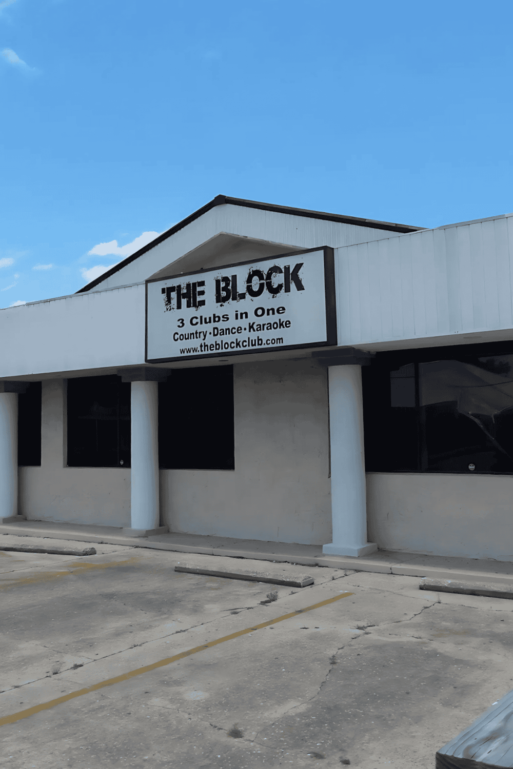 Outdoor club venue with karaoke, country dance, and live music at The Block in a strip mall.