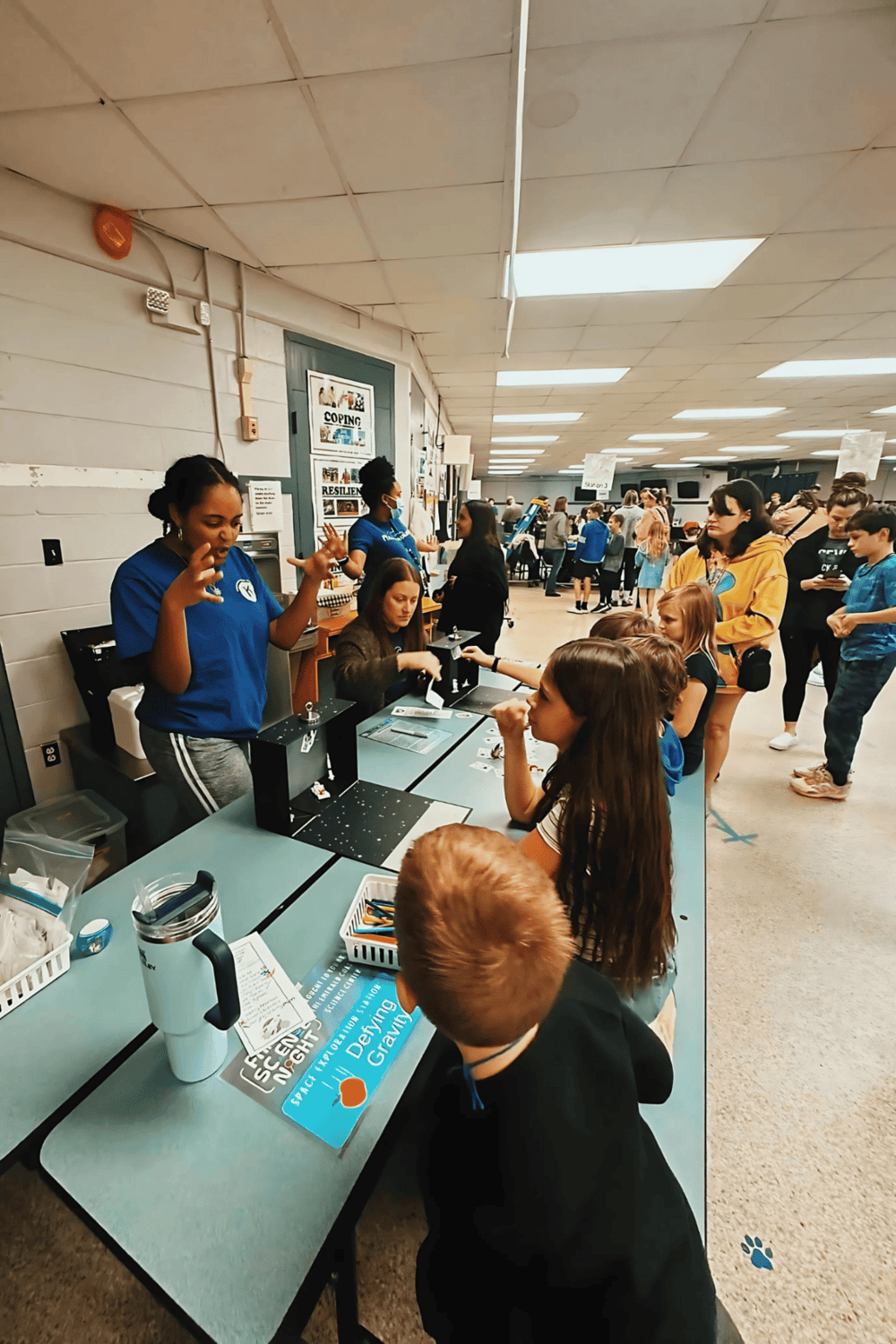 Interactive STEM activity at QuestForDirections space station event.