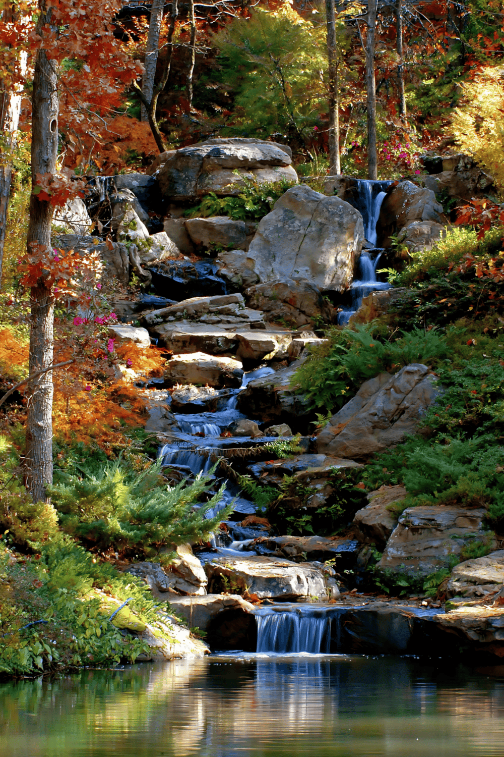 Serene waterfall in vibrant autumn forest, scenic nature, peaceful outdoor retreat, nature photography, fall foliage, quest for directions.