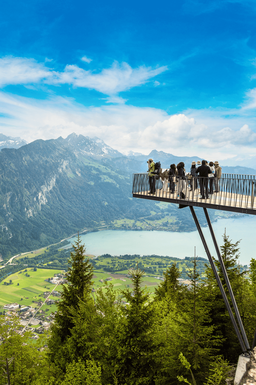 Breathtaking mountain views with observation deck and visitors enjoying scenic landscape.