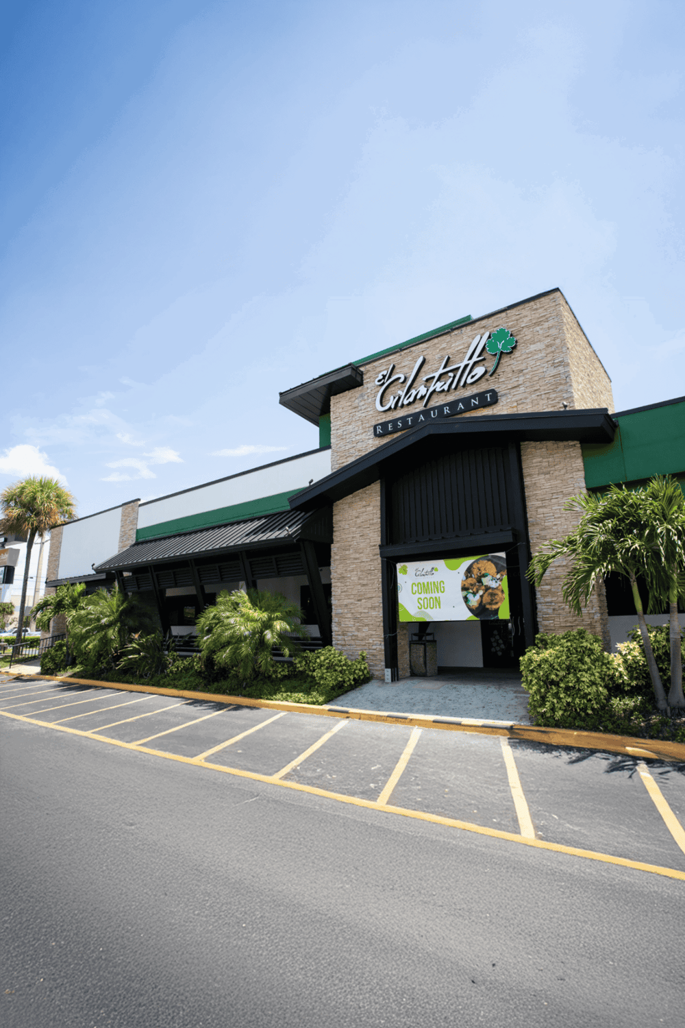 Fresh Seafood Restaurant Exterior with Landscaping and Parking Lot in Florida.