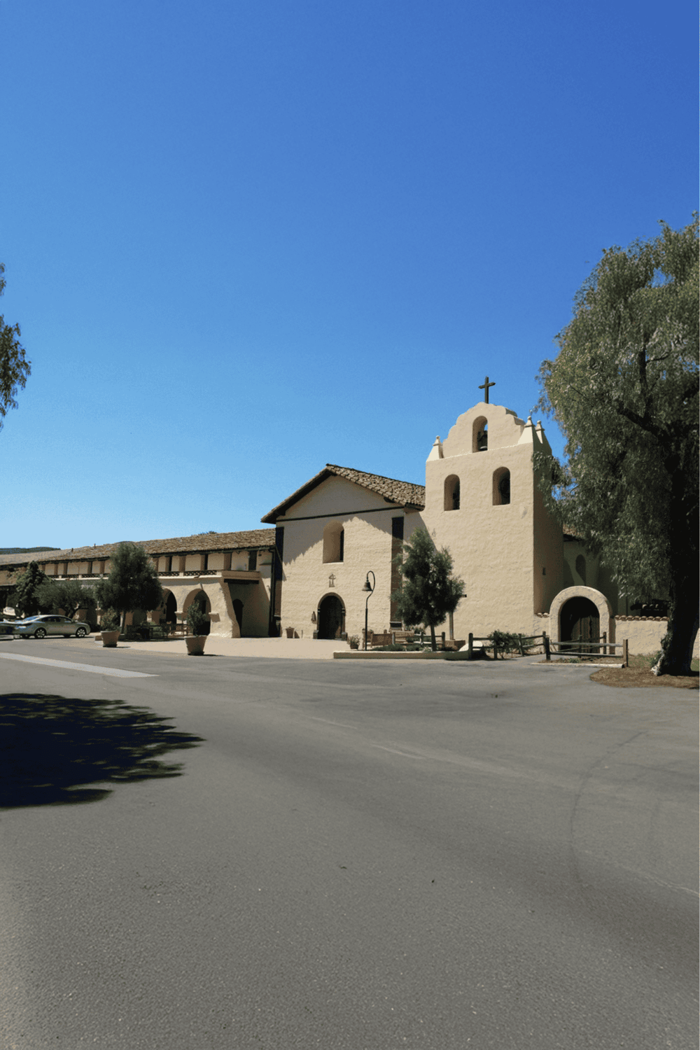 Serene historic church with Spanish architecture and bell tower, perfect for travel and cultural exploration.